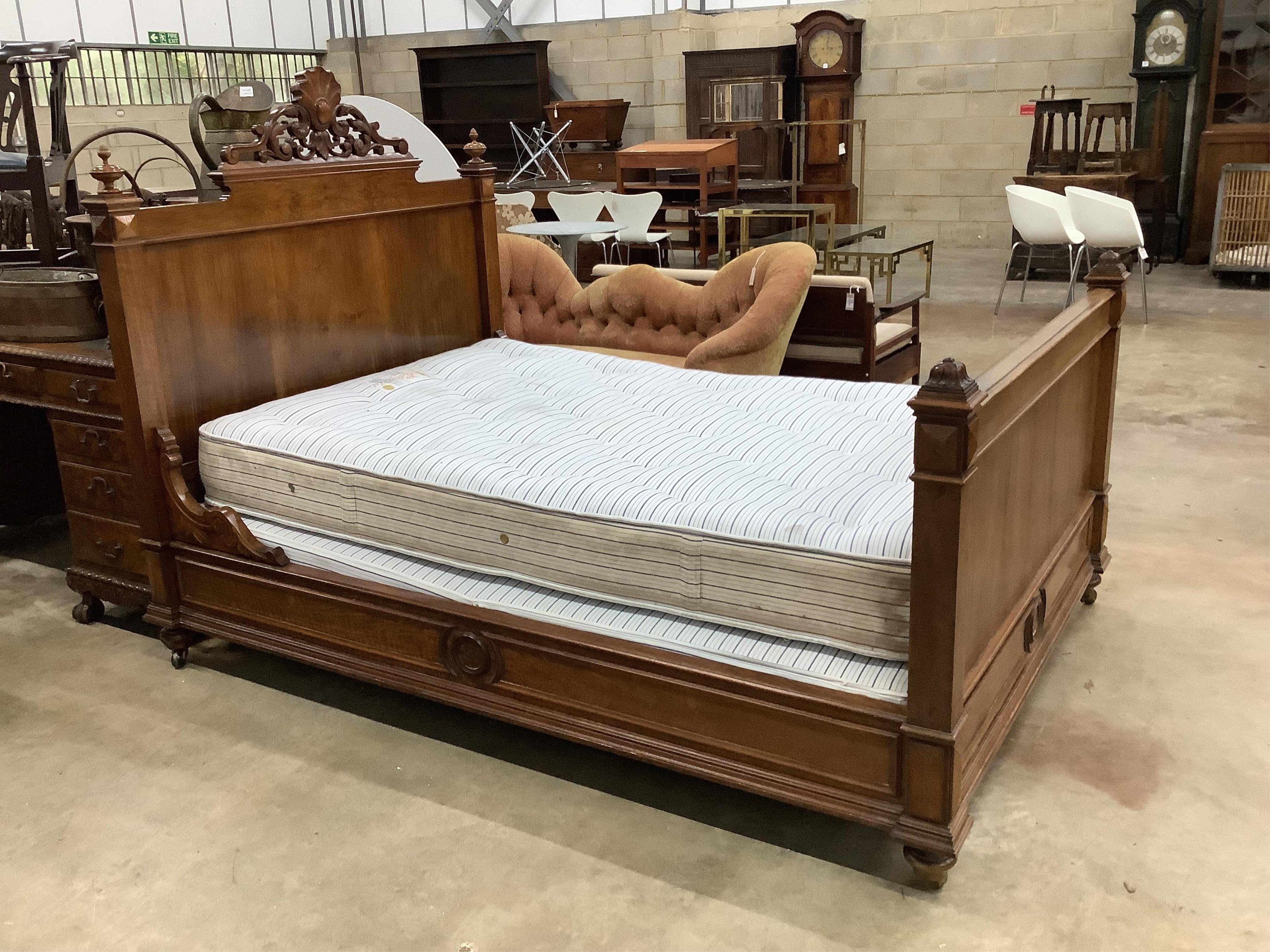 A late 19th century French walnut head and foot double bedstead, width 151cm, length 216cm. Condition - good